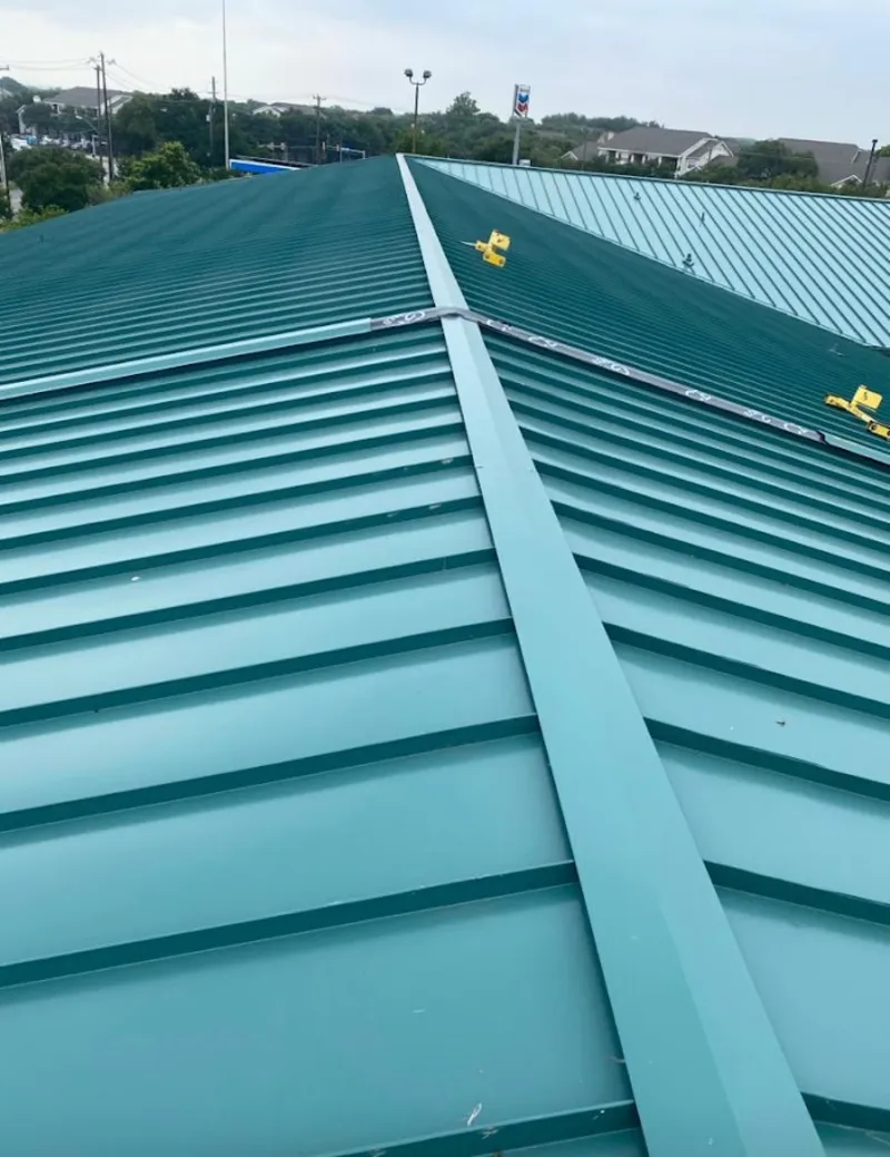 Green commercial metal roof ridge and valley for Metal Roof Repair in Groton
